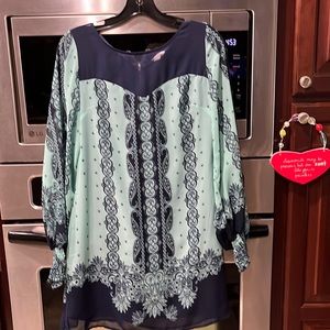 Woman’s dress with sheer sleeves